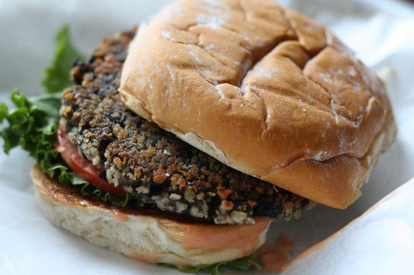 Close up photo of a high protein, vegetarian, black bean burger.