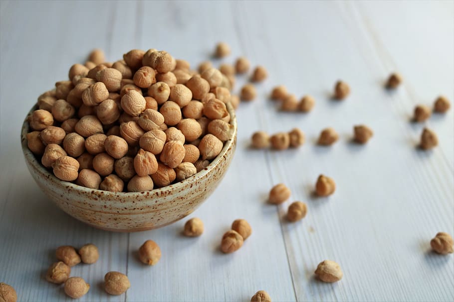 Closeup photo of a bowl of chickpeas, a great source of protein for vegetarians.